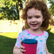 Load image into Gallery viewer, Go Sili pink 360 Sippy Cup held by little girl.