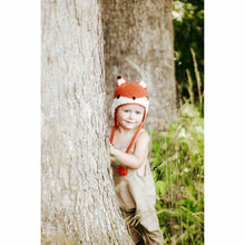 Load image into Gallery viewer, Hand knit orange cream fox baby hat with braided ties and ear flaps. On toddler.