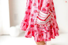 Load image into Gallery viewer, Pink Heart Suckers Print ruffle Twirl Dresses for girls with pockets. close up of pockets.