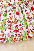 Load image into Gallery viewer, Grinch Cindy Lou White &amp; Green Pattern Dress close up.