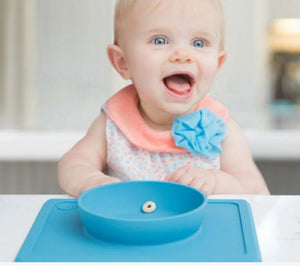 Ezpz blue mini bowl suction bowl dish baby can’t pull off table.  Less mess