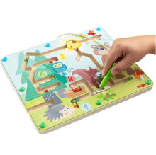 Load image into Gallery viewer, HABA Magnetic Maze Forest Friends Travel Toy in use.