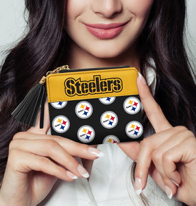 Pittsburgh Steelers NFL Black Logo Tassel Wallet. Model Holding Wallet for Size.
