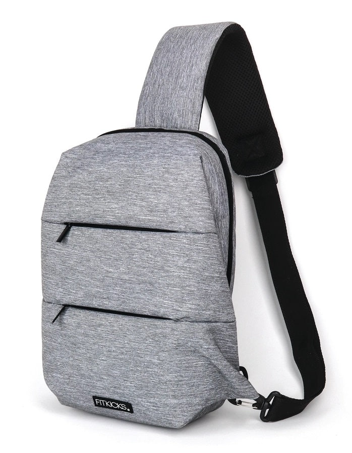 Sling backpack or front cross body bag in gray. 