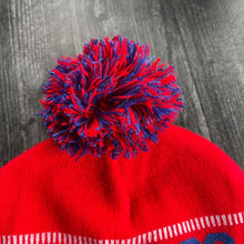 Load image into Gallery viewer, Let&#39;s Go Buffalo knit pom pom adult size beanie hat red &amp; blue close up